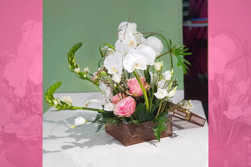 Arrangement floral dans petit coffret bijou